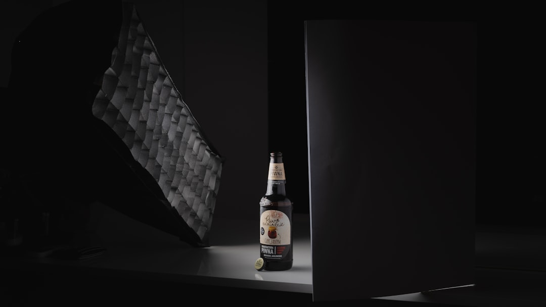 black and brown labeled bottle