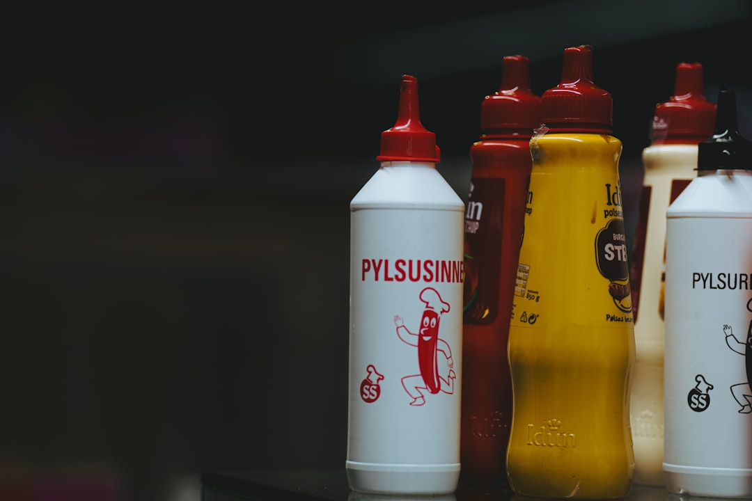 a row of plastic bottles sitting on top of a table