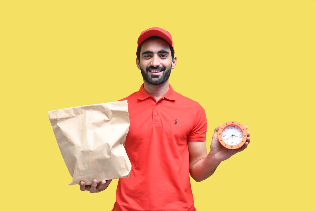 a man holding a paper