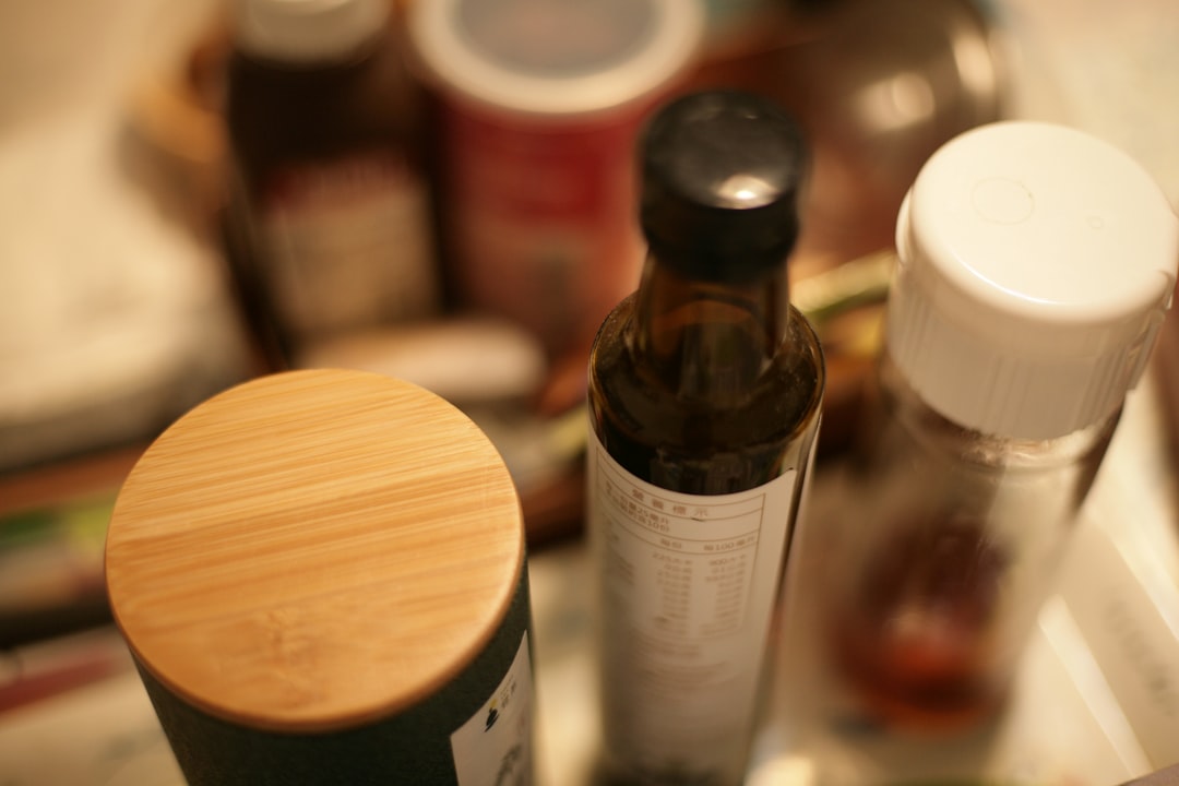 Assortment of bottles and containers on a shelf.